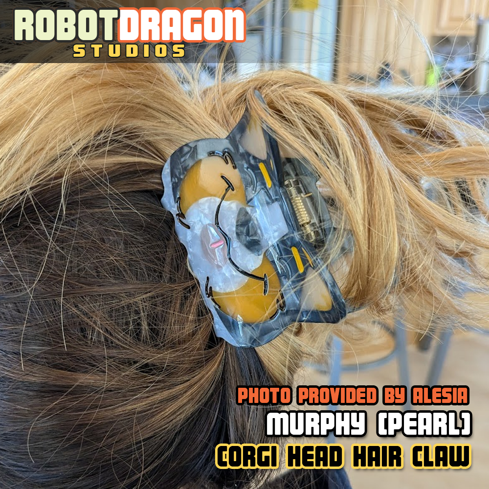 Close-up of a customer wearing the Murphy hair claw with their messy hair up.
