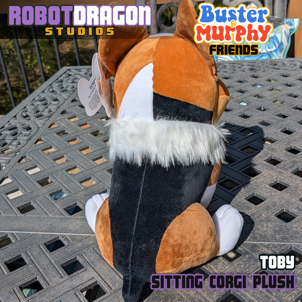 Back of a limited edition Toby red-headed tricolor corgi plush designed and created by Robot Dragon Studios.