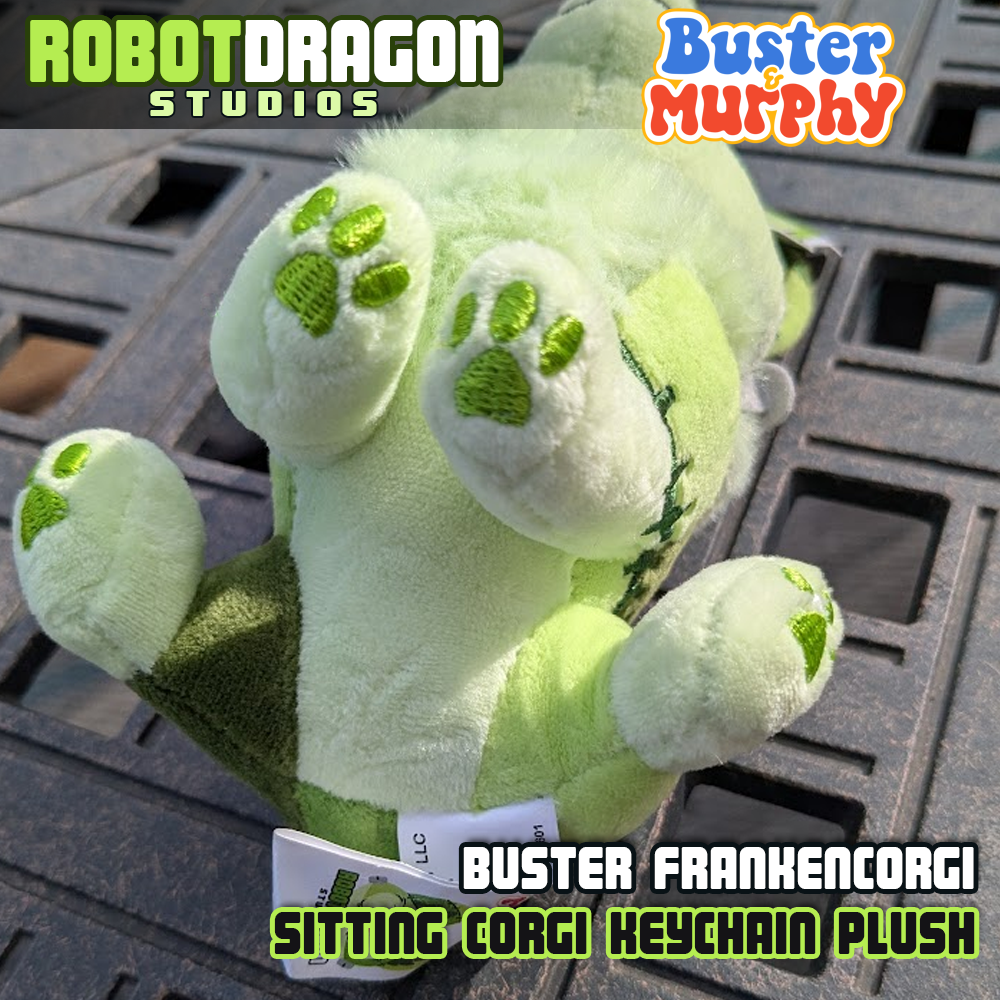 Bottom of a Buster Frankencorgi keychain designed and created by Robot Dragon Studios.