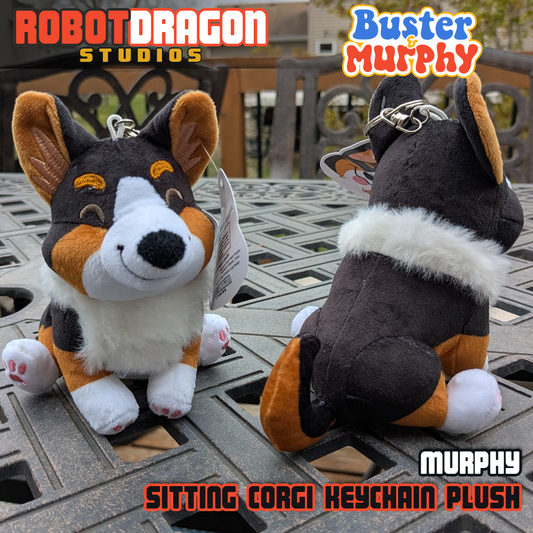 Back and front of two Murphy black tricolor Pembroke corgi keychains designed and created by Robot Dragon Studios.