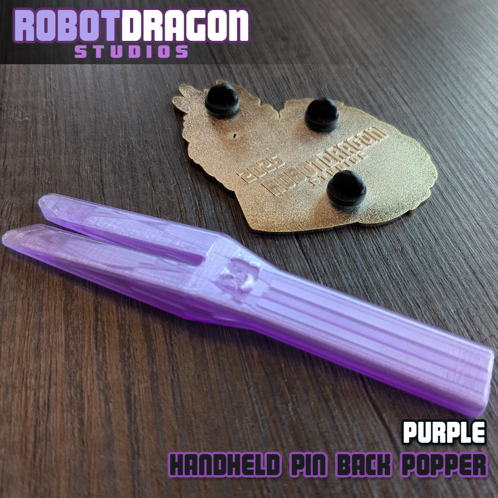 Purple 3D printed handheld enamel pin pin-back popper from Robot Dragon Studios