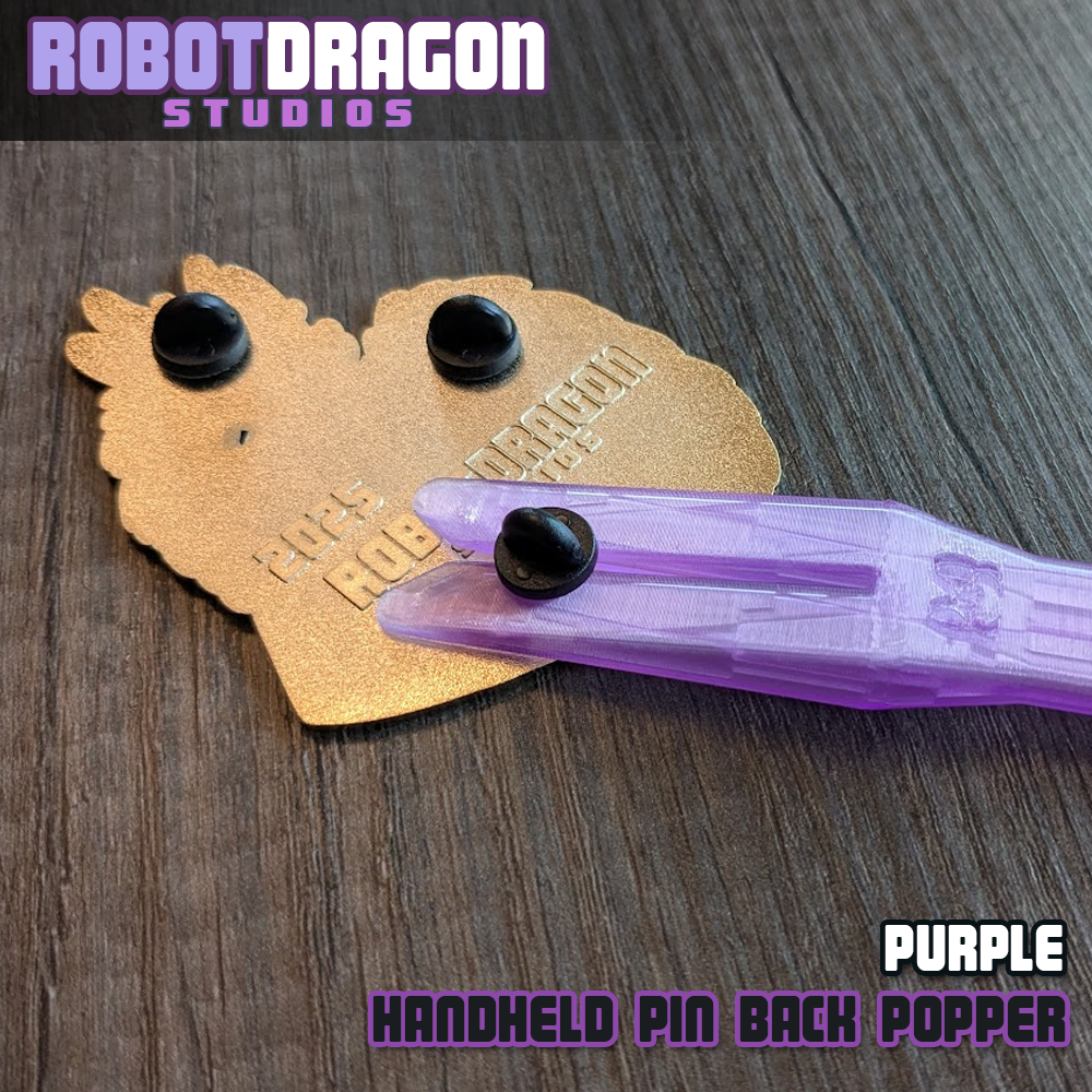 Purple 3D printed handheld enamel pin pin-back popper from Robot Dragon Studios