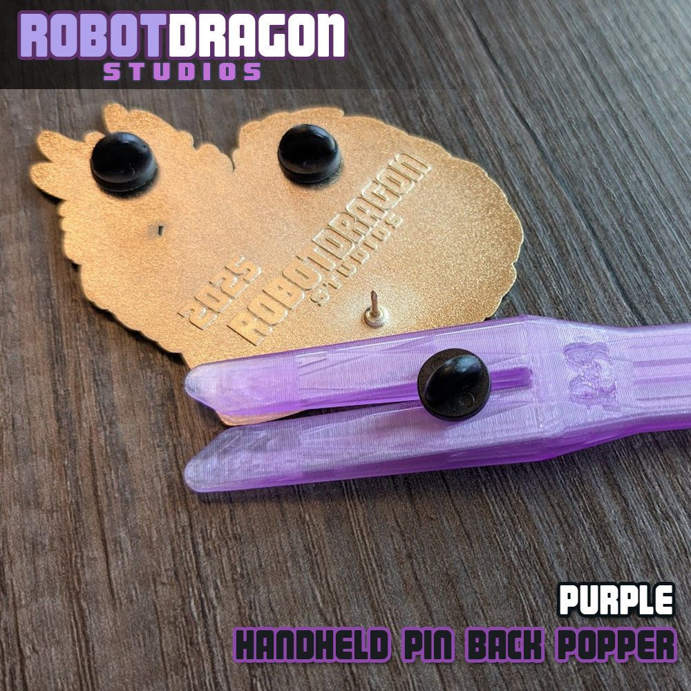 Purple 3D printed handheld enamel pin pin-back popper from Robot Dragon Studios