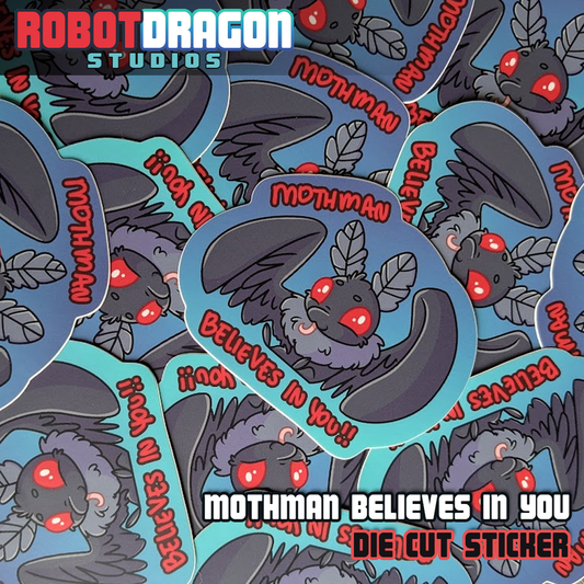 Pile of die cut Mothman Believes In You stickers from Robot Dragon Studios.