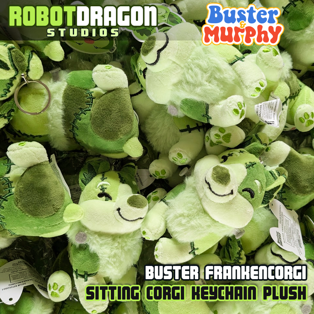 Pile of a Buster Frankencorgi keychain designed and created by Robot Dragon Studios.
