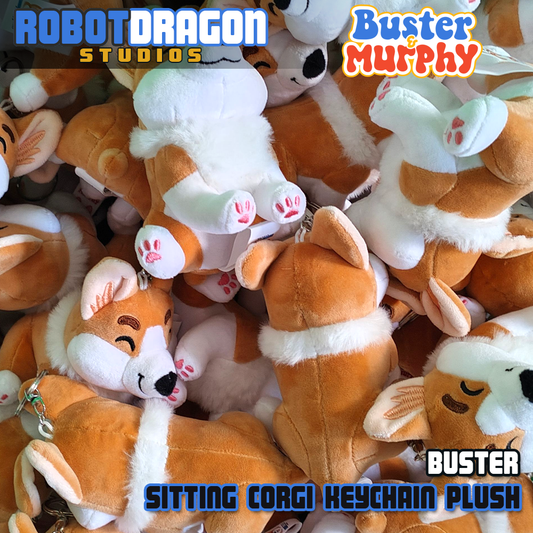 Pile of Buster red Pembroke corgi keychains designed and created by Robot Dragon Studios.