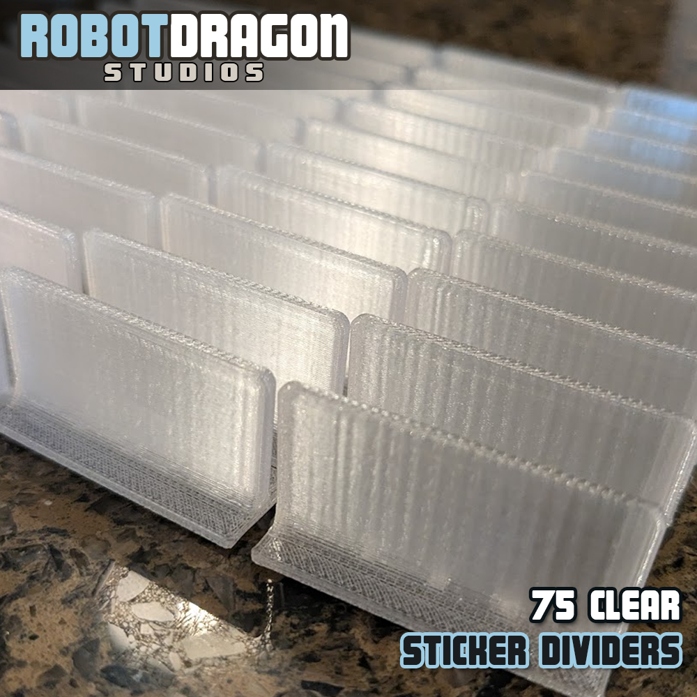 Close up photo of a row of 3D printed clear translucent PETG sticker dividers designed and created by Robot Dragon Studios for artist alley.