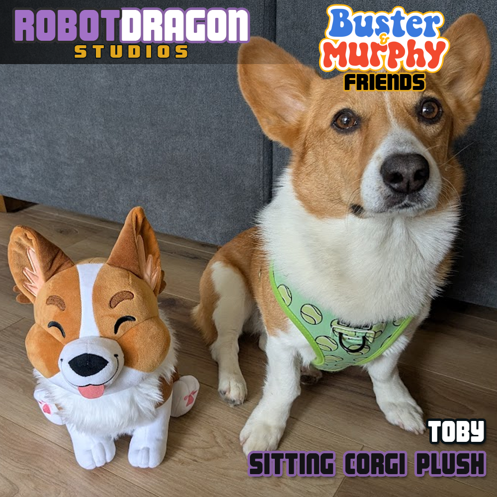 Corgi dog playing with a limited edition red tricolor corgi plush, a friend of Buster and Murphy from Robot Dragon Studios.